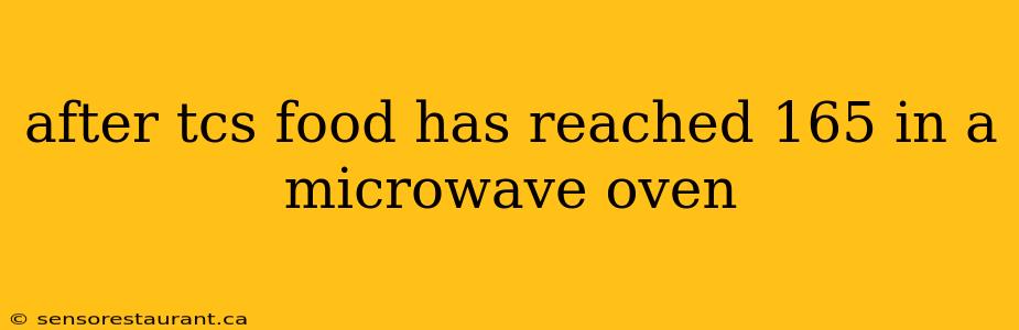 after tcs food has reached 165 in a microwave oven